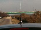 Car and mobile antenna. In background another Bridge access North East of Ludo's location on Miribel Island