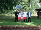 The team under Antoniewo sign.